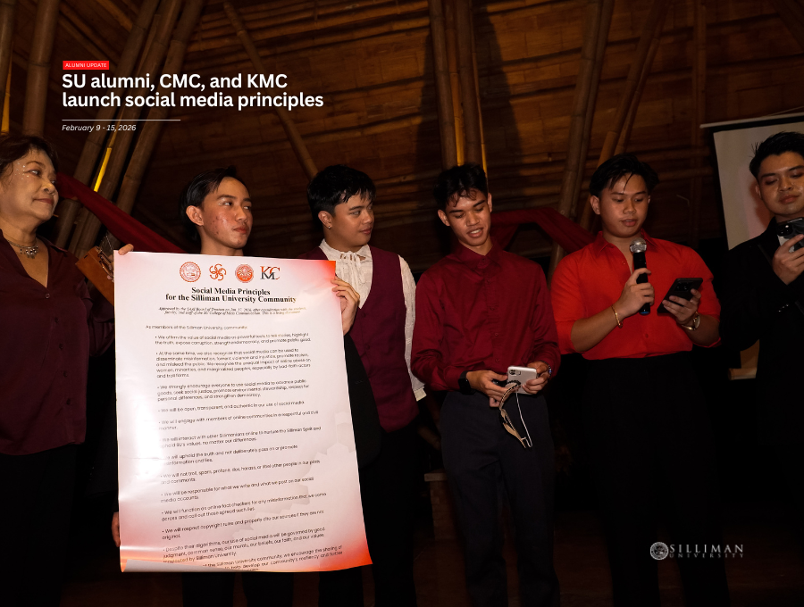 CMC students present a copy of the Social Media Principles, together with CMC Dean Asst. Prof. Irma Faith B. Pal.