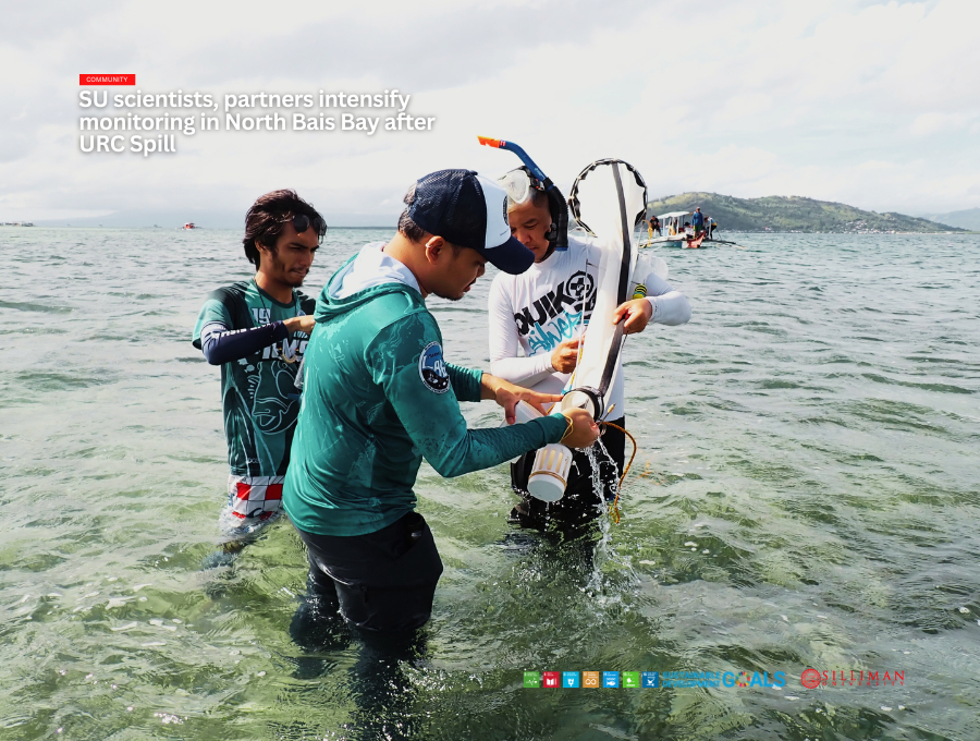 Dr. Adonis Floren (far right) and the Research Assistants of SU-IEMS retrieve plankton samples using a plankton net from North Bais Bay.