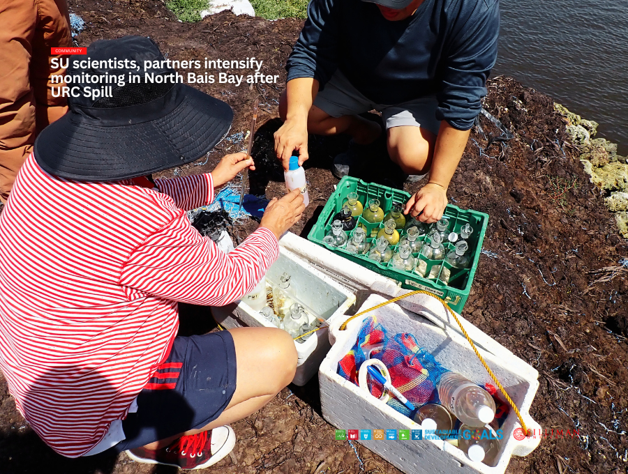 Chemists Dr. Paulina Aspilla of Foundation University and Dr. Melchor Cerdania of the SU Chemistry Department collect water samples from North Bais Bay.