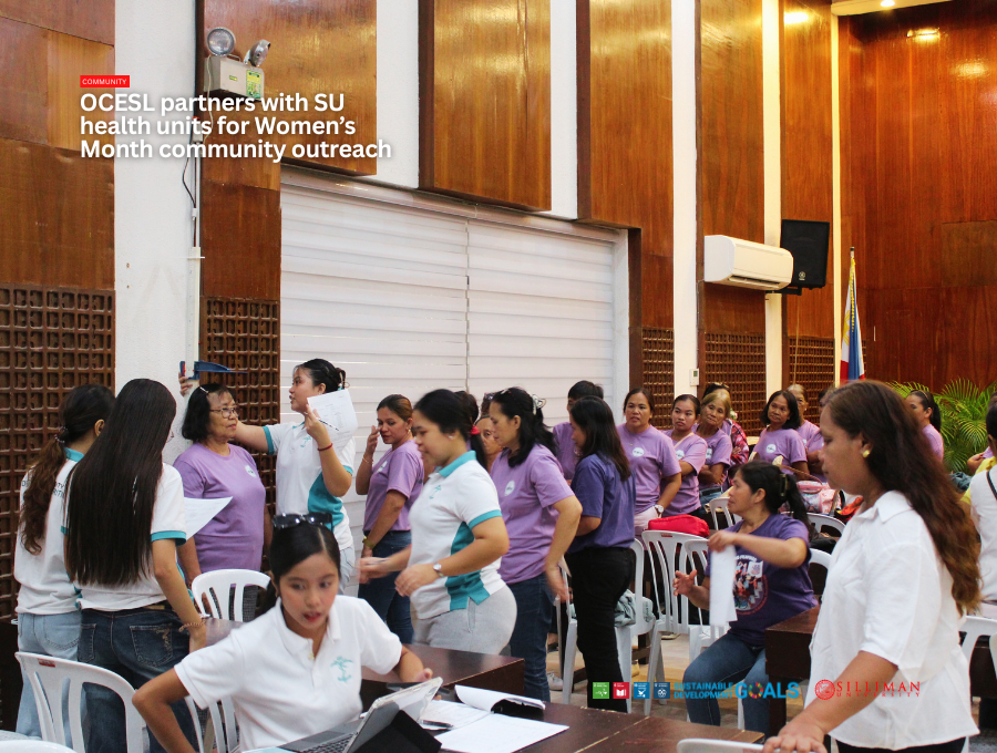 Representatives from Nagkahugpong nga mga Kababayen-an sa Barangay Palinpinon (NAKAPA) line up to get their height measurements taken by students from the ND Department.