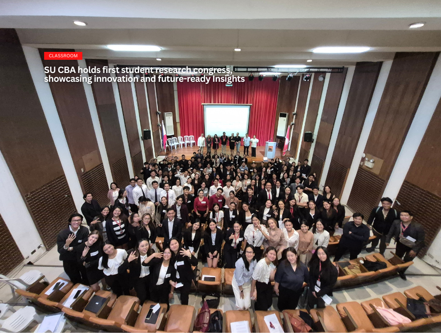 Student-researchers pose with the faculty and staff of the College of Business Administration.