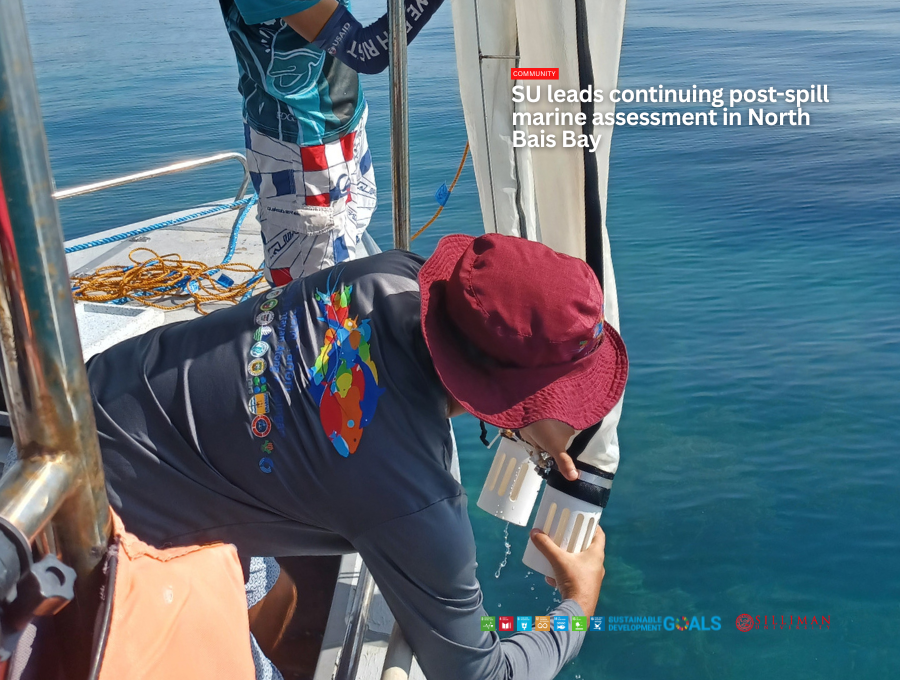 IEMS Research Assistant Darren Rodrigues retrieves samples from a plankton net, assisted by Terence Parvus, an IEMS alumnus and Marine Biologist at DENR-TSPS.