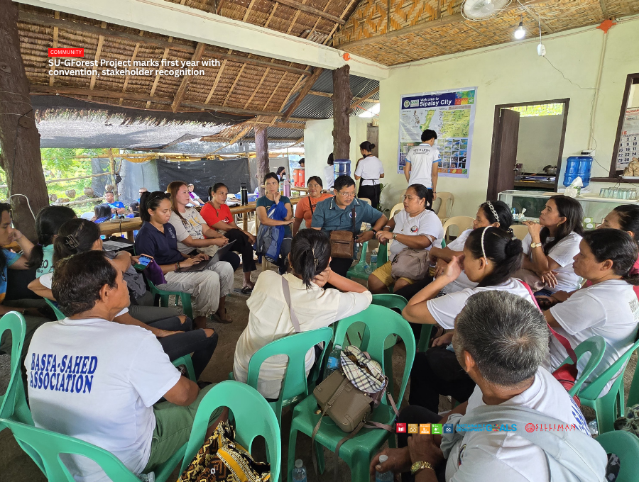 Representatives from the Hinoba-an Municipal Environment and Natural Resources Office (MENRO) and partner people’s organizations engage in a breakout planning session.