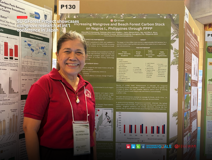 Dr. Hilconida P. Calumpong stands with her research poster, “Increasing Mangrove and Beach Forest Carbon Stock on Negros Island, Philippines through PPPP.”
