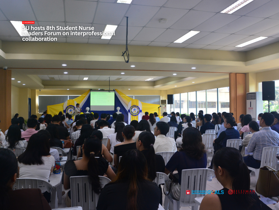 Participants attend the forum.