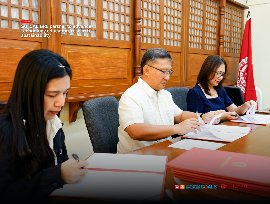 The signing of the MOU commences, led by CALIBR8 CEO Danilo Sebastian L. Reyes (center) and Dr. Lily Ann D. Bautista (right), SU vice president for Academic Affairs and Research. They are joined by CALIBR8’s Erzalyn Lorenzo, HR Learning and Development Partner.